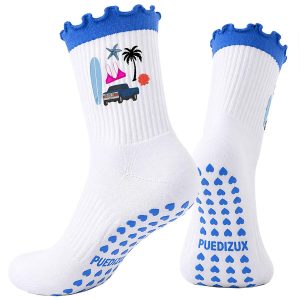 Puedizux review image: white printed socks with blue grip dots. Product facts unverified.