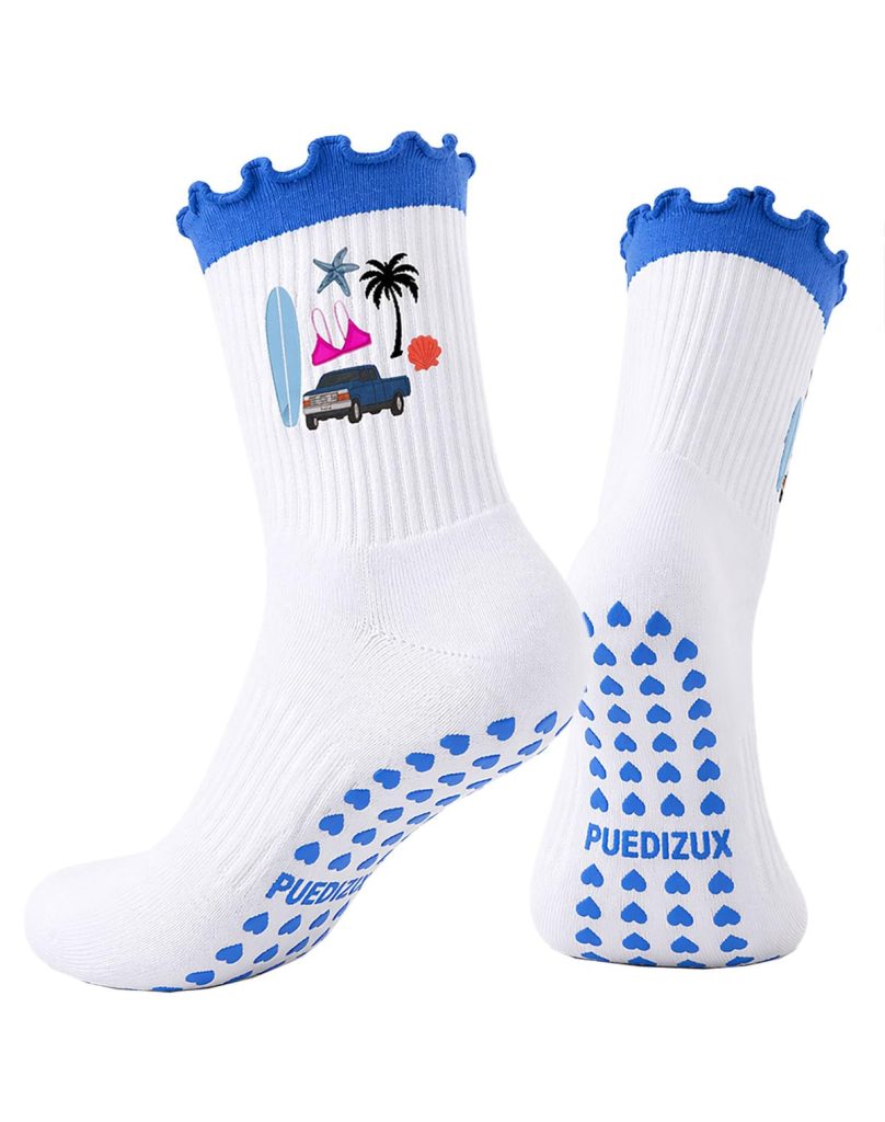 Puedizux review image: white printed socks with blue grip dots. Product facts unverified.