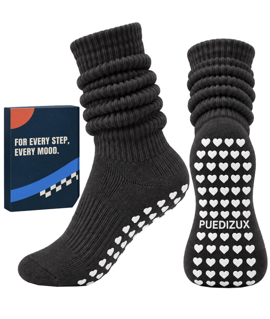 Puedizux review image: black studio socks with white grip dots. Product facts unverified.